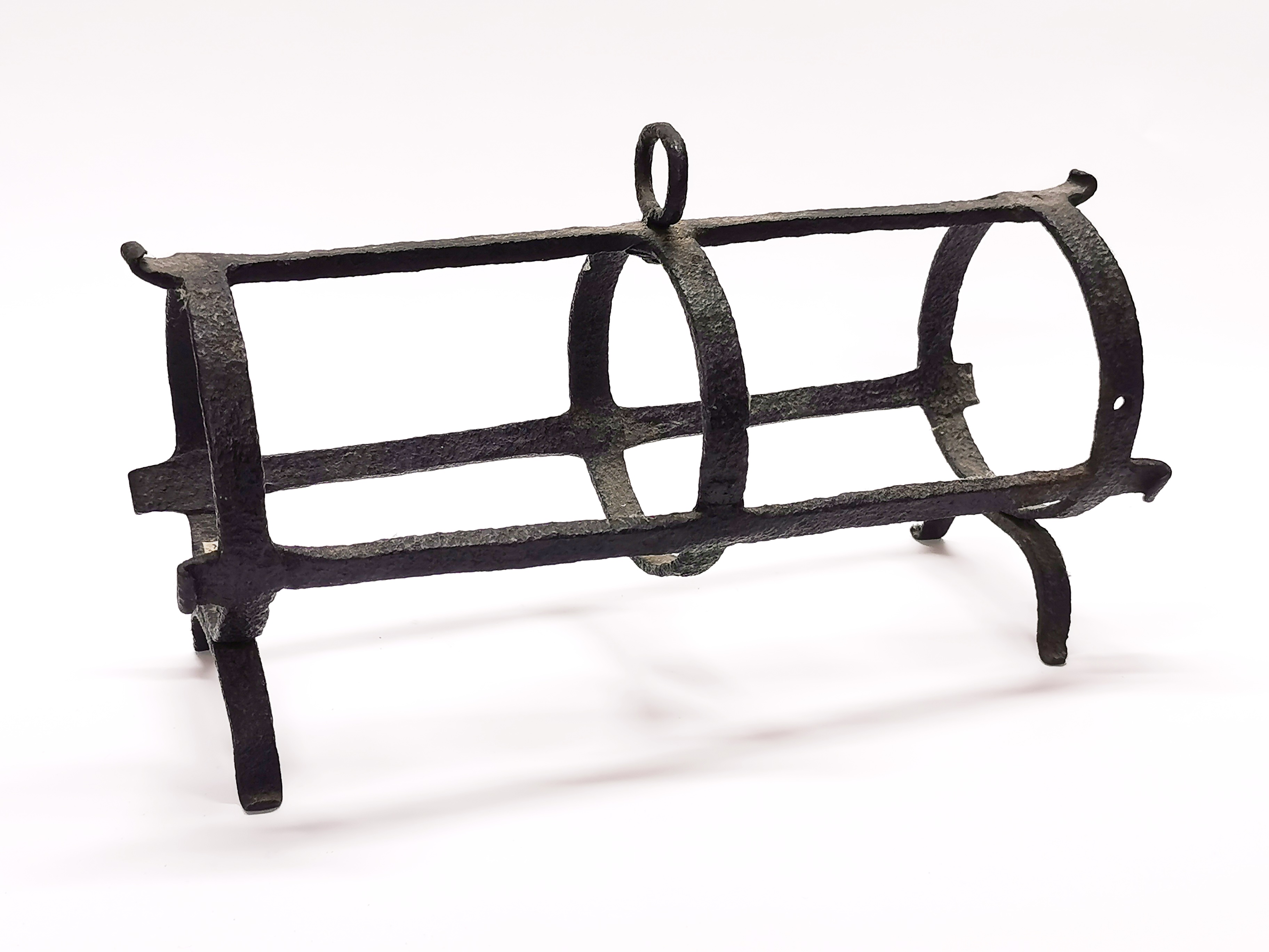 An 18th century wrought iron pipe kiln, L. 35cm. Prov. Estate of the late Dr. James (Jim) Bynon.