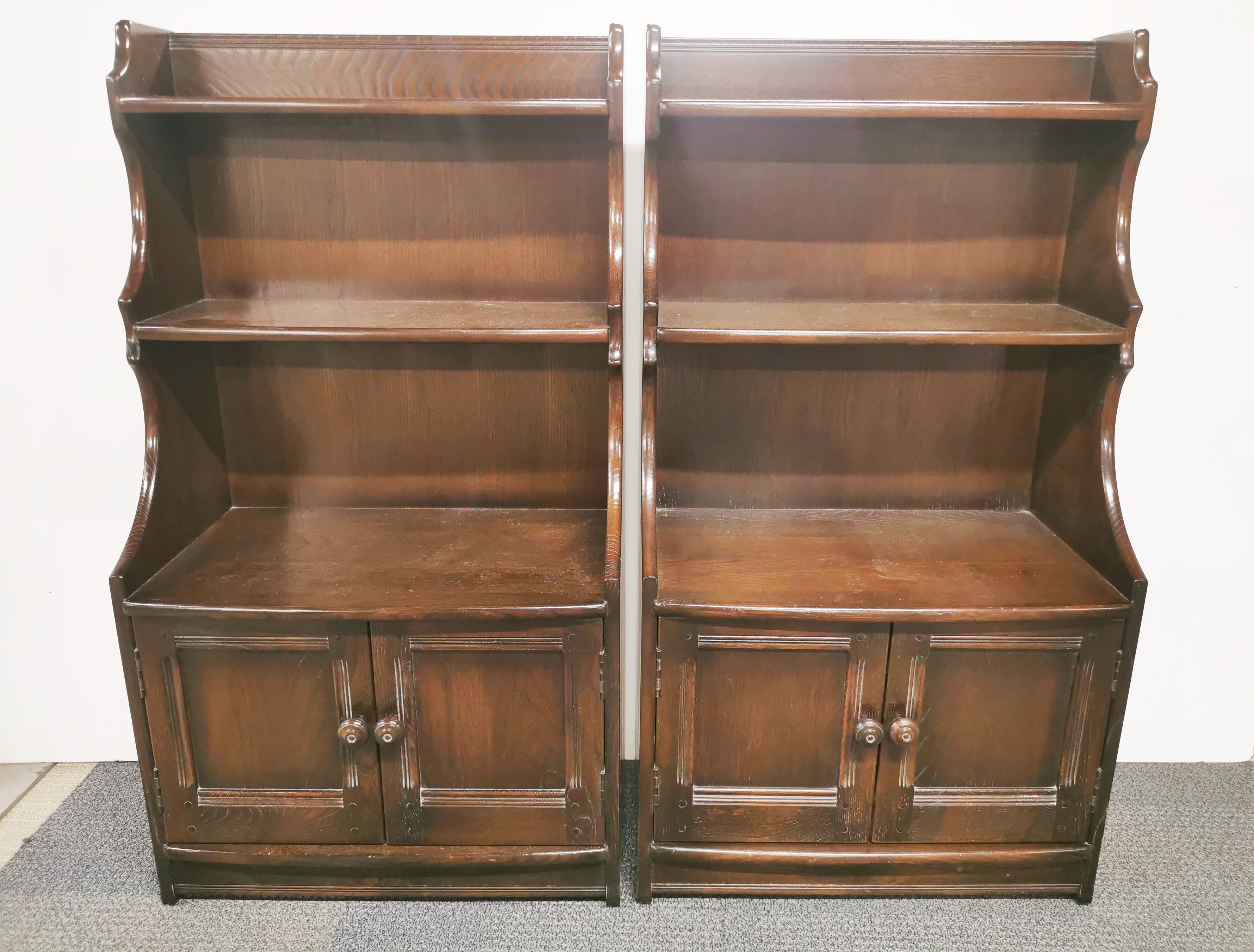 A pair of small vintage oak two shelved cabinets, 111 x 60 x 33cm.