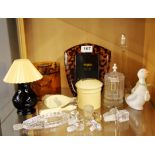 A group of mixed dressing table items and spare perfume bottle stoppers.