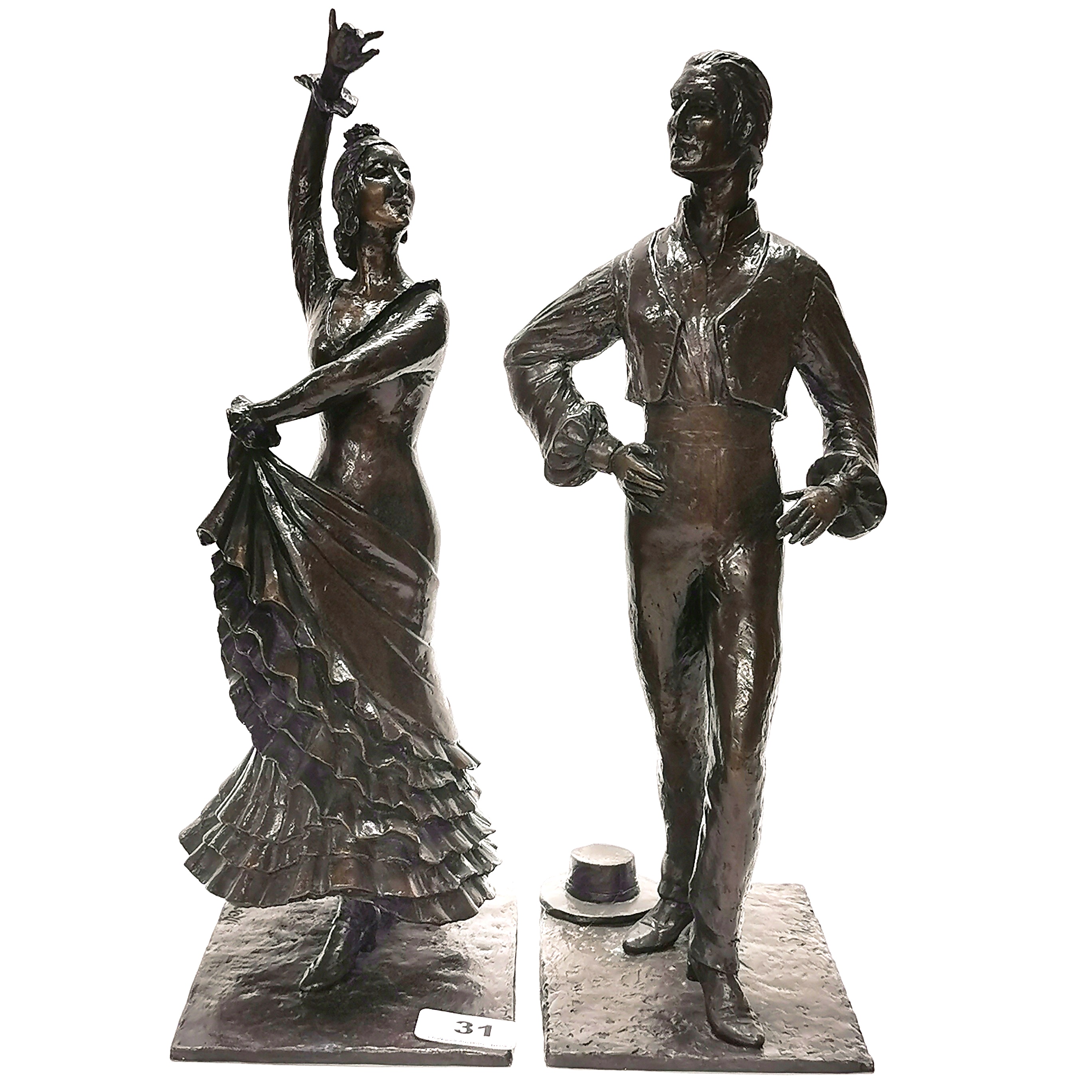 An interesting pair of cast bronze figures of flamenco dancers after S. Mitchell, H. 36cm.