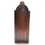 An early oak wall mounted candle box, c. 1700, H. 41cm. Prov. Estate of the late Dr. James (Jim)