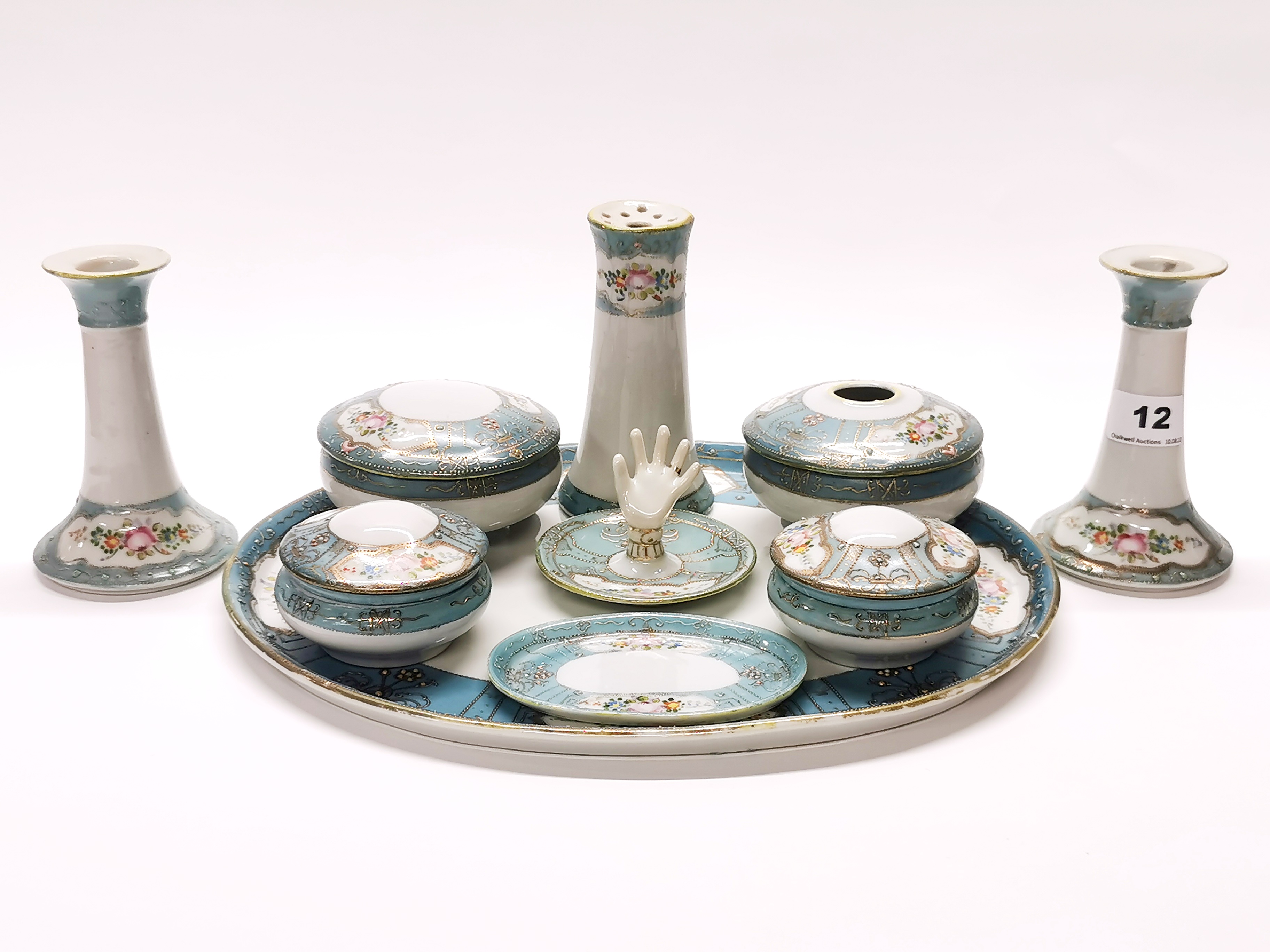 An extensive Japanese Nippon porcelain dressing table set.