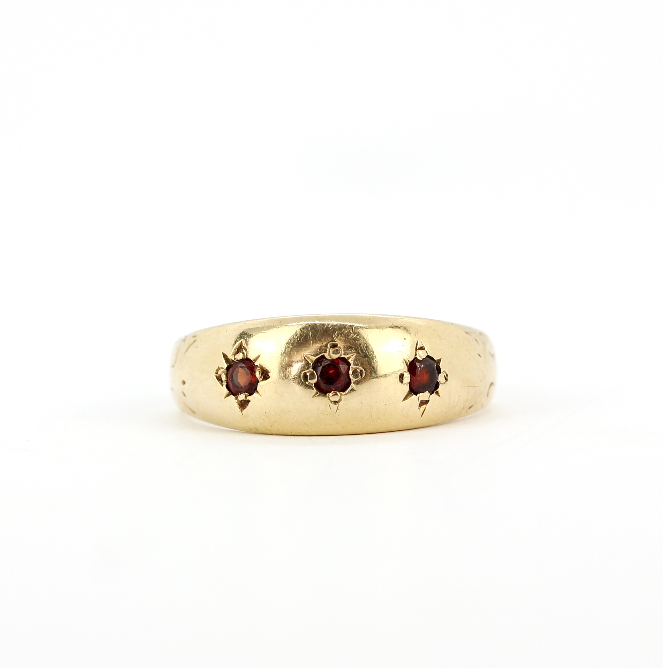 A hallmarked 9ct yellow gold ruby set ring, (N).