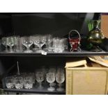 A group of mixed glassware, including a punch set.