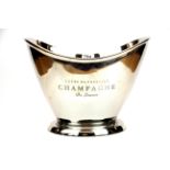 A stainless steel advertising champagne bucket, W. 35cm, H. 26cm.