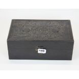 A Chinese carved hardwood box, decorated with a bat and two peaches, 30 x 18 x 12cm.