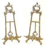 A pair of useful brass painting easels, H. 50cm.