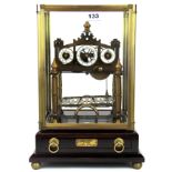 A four glass cased rolling ball Congreve style skeleton clock with bevelled glass panels, 39 x 27