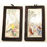 A pair of wooden framed Chinese porcelain panels of famous legends, 16 x 29cm.