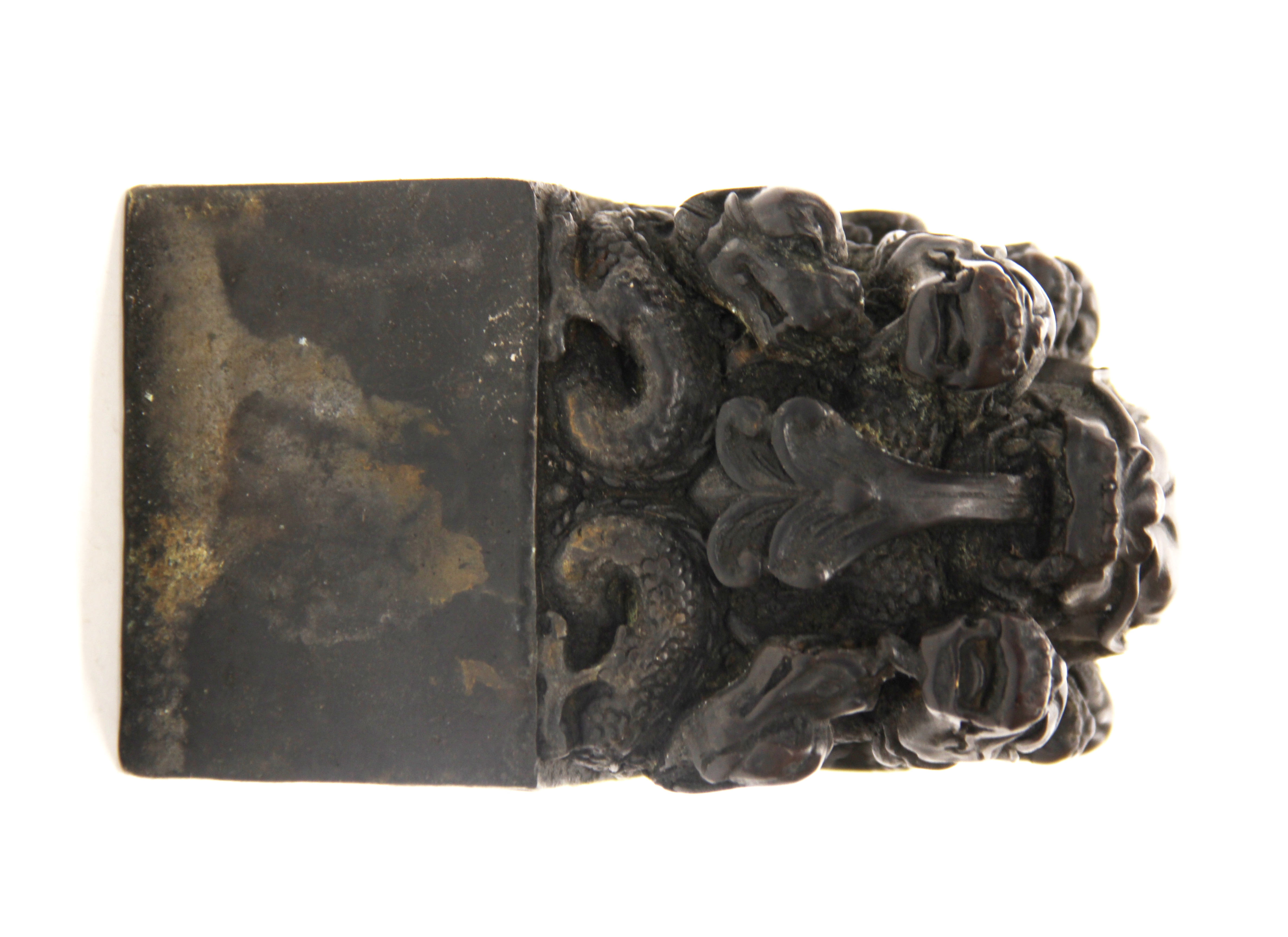 A heavy Chinese cast bronze scholar's seal decorated with dragons, H. 14cm.