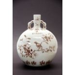 A lovely Chinese hand painted porcelain vase with underglaze iron red decoration of birds among