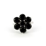 A 925 silver ring set with large round cut black spinels, (S).