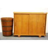 A handmade oak shoe cabinet, c. 1960, 68 x 27 x 53cm, together with a brass and hardwood coopered