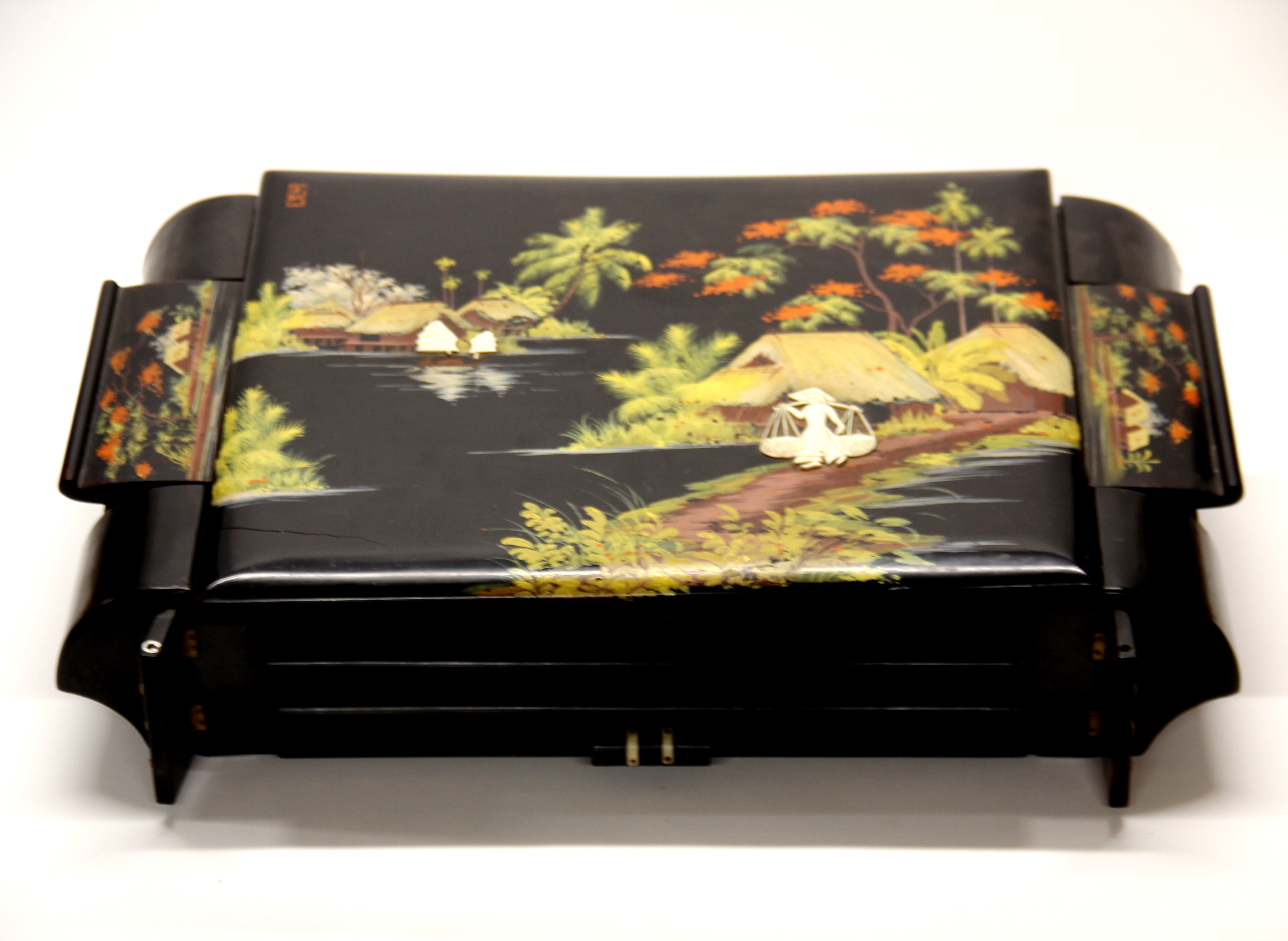 A Chinese 1920's lacquered and bone inlaid dressing table set, W. 50cm.