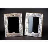 A pair of Art Nouveau style hallmarked silver faced photo frames, 14 x 19cm.