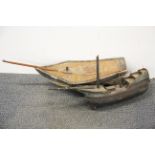 Two antique model wooden boats, one with sheet copper covered hull, longest L. 75cm.