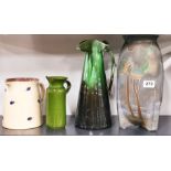 An Art Deco pottery vase, H. 31cm, together with three other cermaic items.