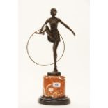 A large Art Deco style bronze figure of a hoop girl on a marble base after D. Alonzo, H. 48cm.