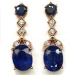 A pair of rose gold on 925 silver drop earrings set with oval cut sapphires and white stones, L.