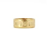 A hallmarked 9ct yellow gold wedding band, (M).