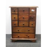 A small mahogany chest of drawers, W. 40cm, H. 54cm.