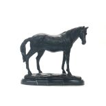 A bronze figure of a horse on a marble base, H. 22cm.