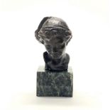 A small Italian style bronze bust on a marble base, H. 14cm.
