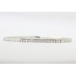 A 925 silver tennis bracelet set with princess cut cubic zirconias, L. 18.5cm.