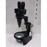 A W. Watson & Sons microscope.