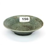 A Chinese celadon crackle glazed porcelain bowl, Dia. 14cm, D. 3.5cm.