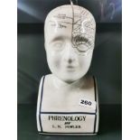 A crackle glazed porcelain phrenology head, H. 29cm.