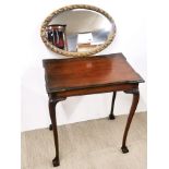 An Edwardian ball and claw foot side table, 63 x 41 x 72cm, together with a gilt framed mirror, W.