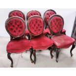 A set of six 19th century Cabriole legged mahogany button backed dining chairs.