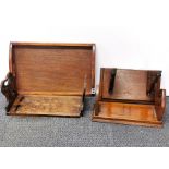 Two Victorian sliding book racks, an oak tray and a carved oak wall bracket.