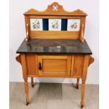 A pretty Edwardian satinwood and marble wash stand with tiled splashback, W. 76cm, H. 116cm.