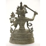 A large Tibetan bronze figure of a seated Tara, H. 38cm.