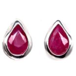 A pair of 925 silver pear shaped ruby set stud earrings, L. 0.9cm.