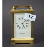 A Mappin and Webb gilt brass carriage clock, H. 15cm (not currently in working order, attention
