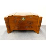 An Oriental carved teak wood and camphor lined blanket box, W. 100cm, H. 57cm.