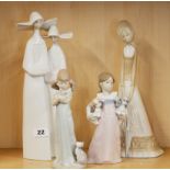 A Lladro figure of two nuns, together with two Lladro figures of children (both A/F; kitten