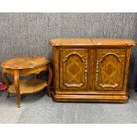 An attractive marquetry style bar cabinet, W. 113cm, with sliding top and matching coffee table.