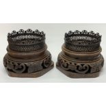 A pair of impressive Chinese carved wood and bronze vase stands, base Dia. 32cm, inner Dia. 21.