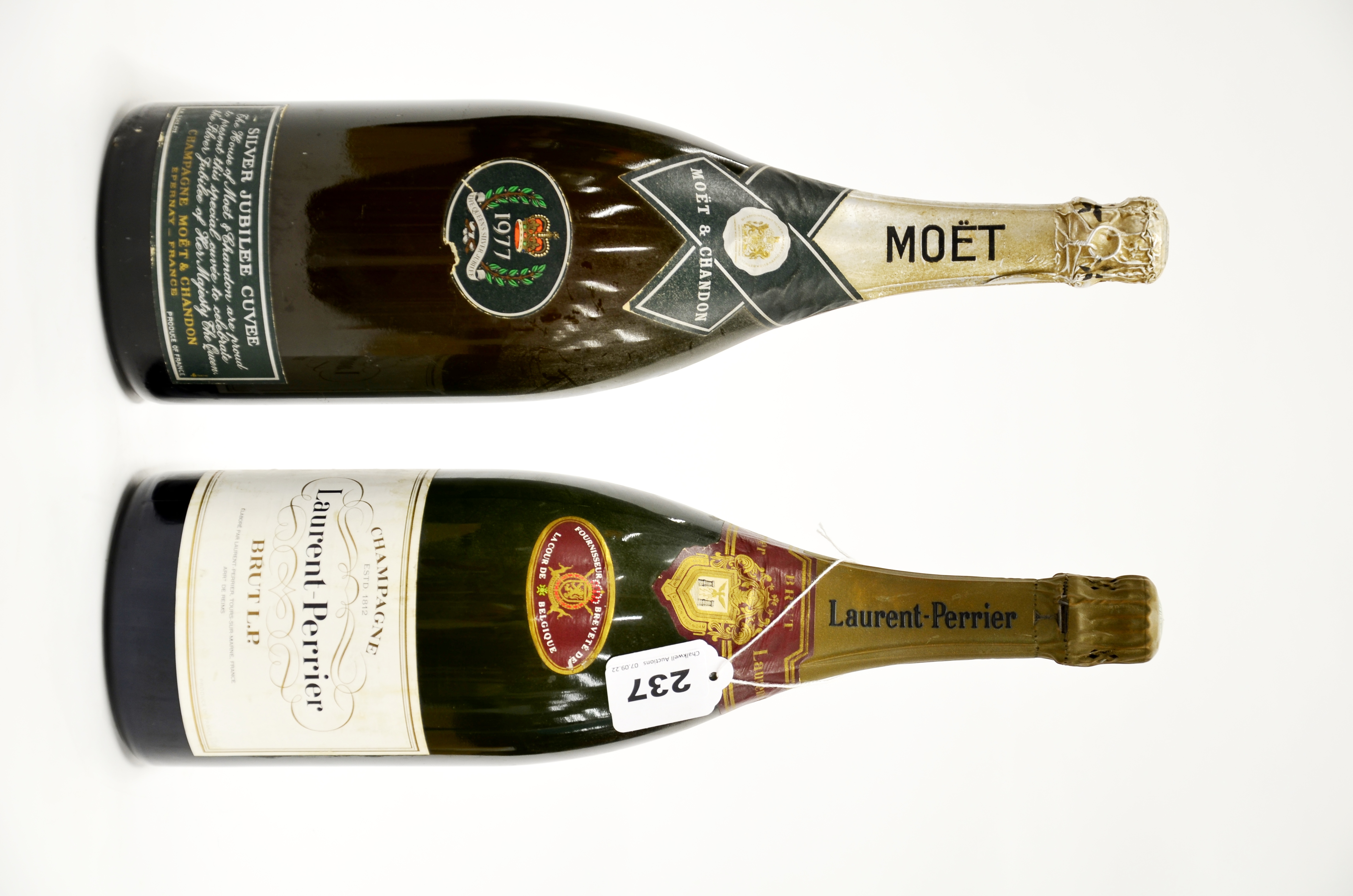 A 1.5L bottle of Laurent-Perrier champagne, together with a 1.5L bottle of silver Jubilee Moet &