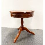 An Oriental teak side table with two drawers, Dia. 54cm, H. 60cm.