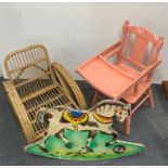A child's high chair, wooden toy horse and cane seat.
