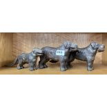 Three antique cast iron dog nutcrackers, longest L. 30cm.