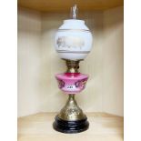 A 19th century glass and brass oil lamp, H. 58cm.