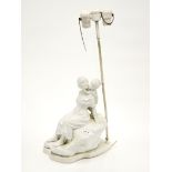 A lovely signed Bisque porcelain figure of a mother and child by Kaesbach, probably Royal