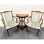 A pair of G Plan teak upholstered dining chairs, with a mahogany console table.