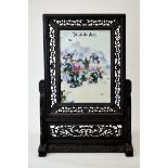 A Chinese wooden framed hand painted porcelain table screen, H. 67cm, W. 45cm.